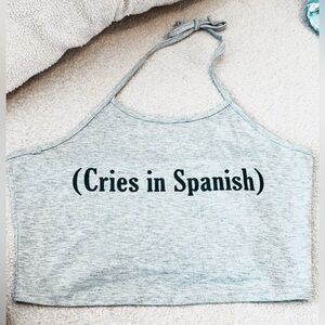 (Cries in Spanish) halter top